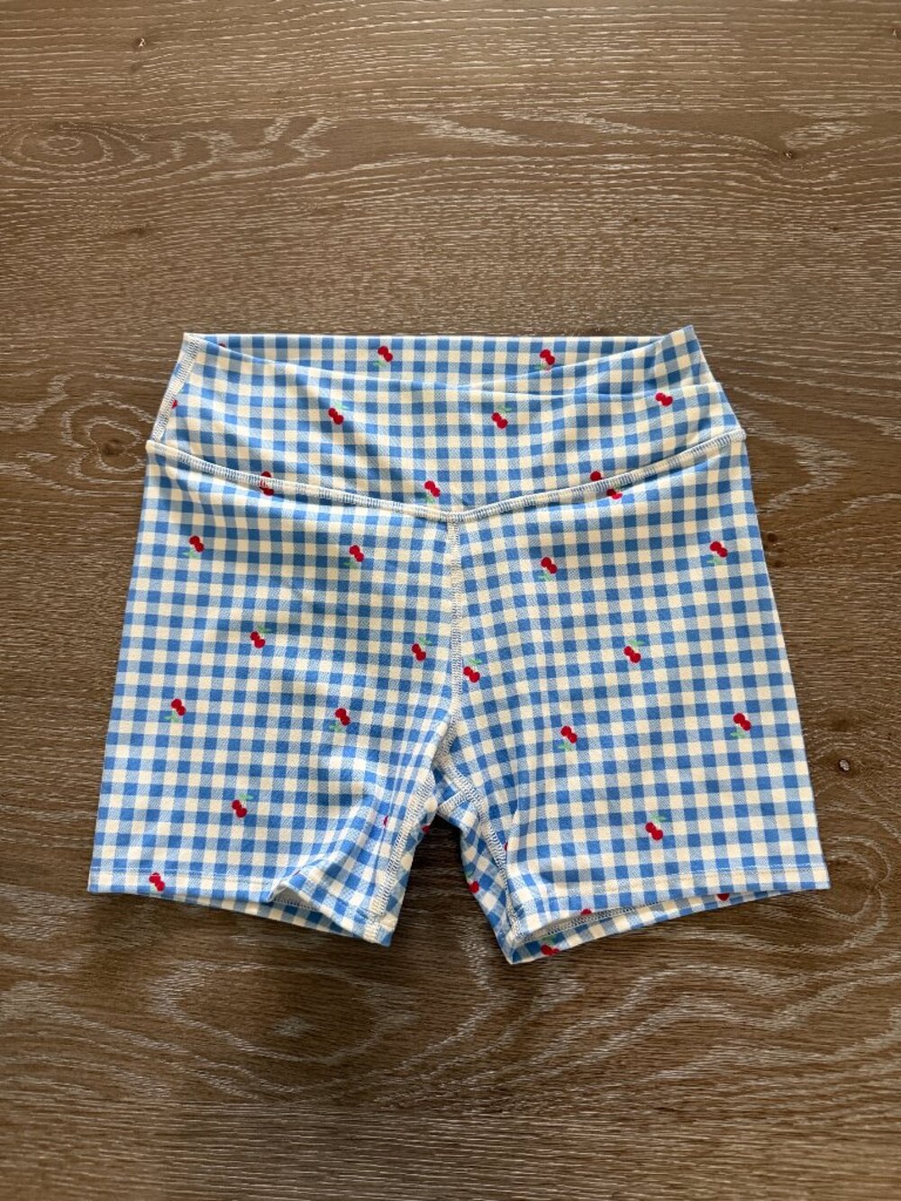 EUC WORN ONCE Girls all in motion blue plaid cherries bike shorts size large